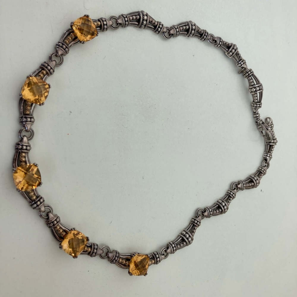 Lagos cetrine necklace with gold accents.